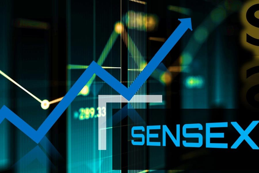 Sensex concludes a volatile session with a gain of 349 points, while Nifty reaches a new record closing high at 22,197