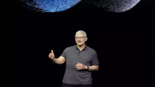 At a Porsche event, Tim Cook, the CEO of Apple, articulates a Vision Pro message.