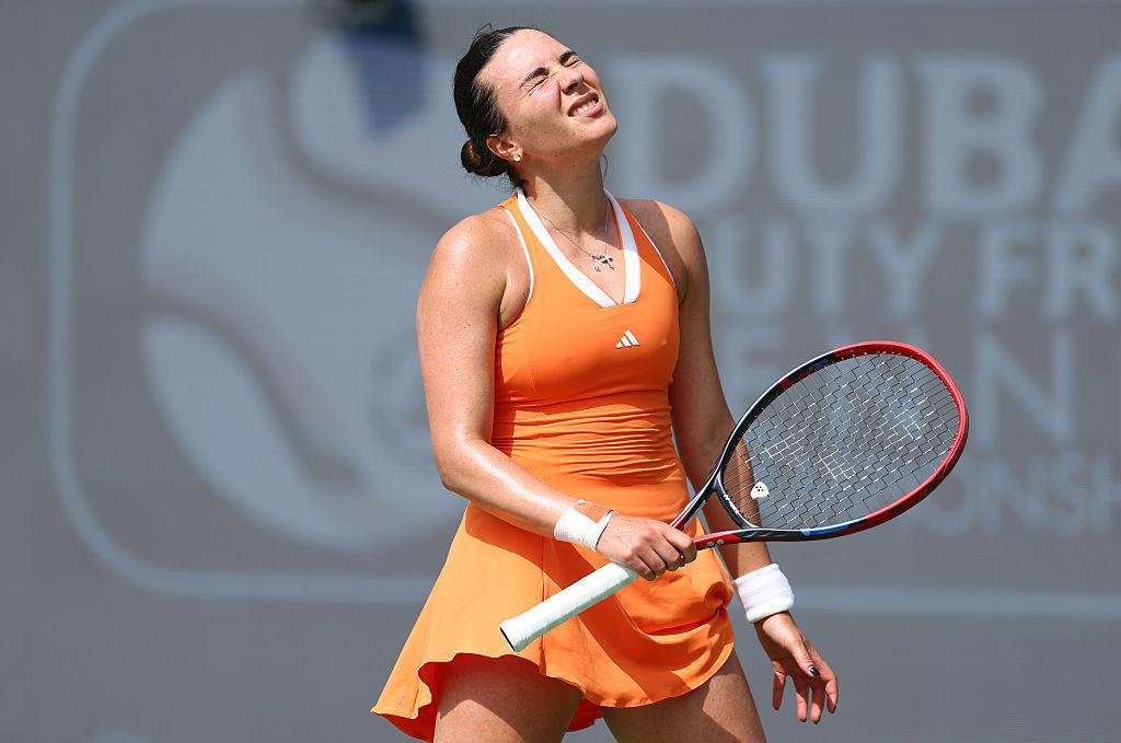 Tennis-Ruzic grabs Dubai spotlight as lucky loser shocks Raducanu